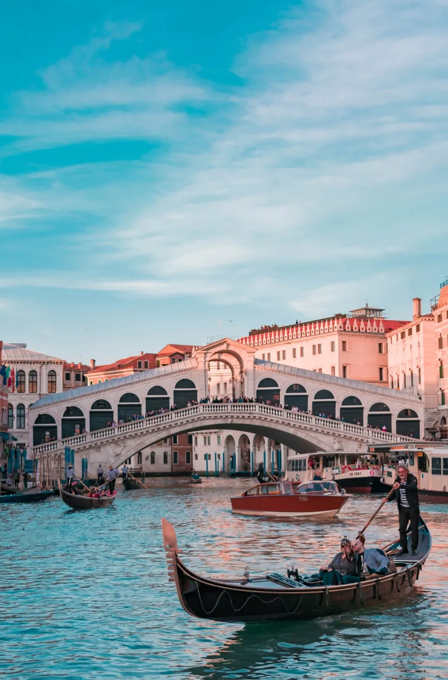 A quiet canal in Venice lined with old facades