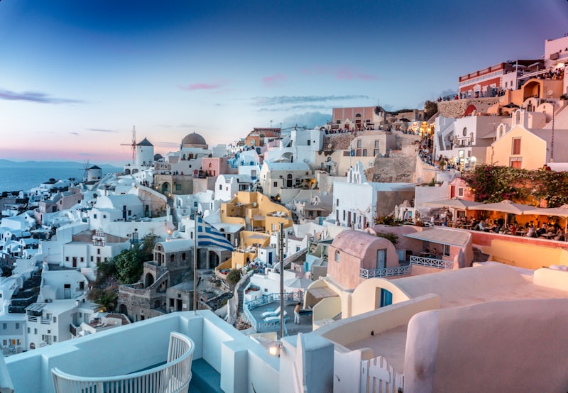 White buildings above the caldera in Santorini